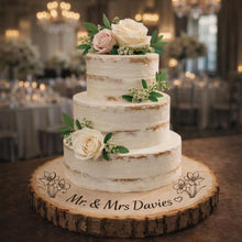 Load image into Gallery viewer, Personalized Wood Slice Cake Stand, Engraved Rustic Wedding Display stand, Personalised Engraved log Slice with Daffodils