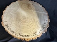 Load image into Gallery viewer, Personalized log Slice Cake Stand, Engraved Rustic wooden Wedding Display stand, Personalised Engraved log Slice, Engagment Dessert Board