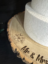 Load image into Gallery viewer, Personalized Wood Slice Cake Stand, Engraved Rustic Wedding Engagment Display stand, Personalised Engraved log Slice with Lillies