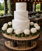 Load image into Gallery viewer, Personalised log slice, Rustic Floral Halo Wood Cake Stand – Wedding Display tree Slice Floral Cake Display Wedding Cake Stand