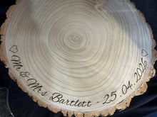 Load image into Gallery viewer, Personalized log Slice Cake Stand, Engraved Rustic wooden Wedding Display stand, Personalised Engraved log Slice, Engagment Dessert Board
