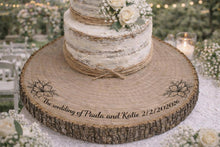 Load image into Gallery viewer, Personalized Wood Slice Cake Stand, Engraved Rustic Wedding Engagment Display stand, Personalised Engraved log Slice with Lillies
