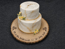 Load image into Gallery viewer, Personalized Wood Slice Cake Stand, Engraved Rustic Wedding Display stand, Personalised Engraved log Slice with Daffodils
