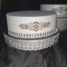 Load and play video in Gallery viewer, set of 7 Crystal cake stands  ascending style design wedding cake stands by Crystal wedding uk
