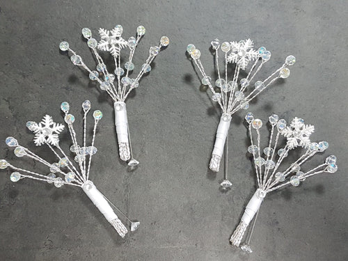Snowflake buttonhole with Ab crystals  for a Winter wedding by Crystal wedding uk