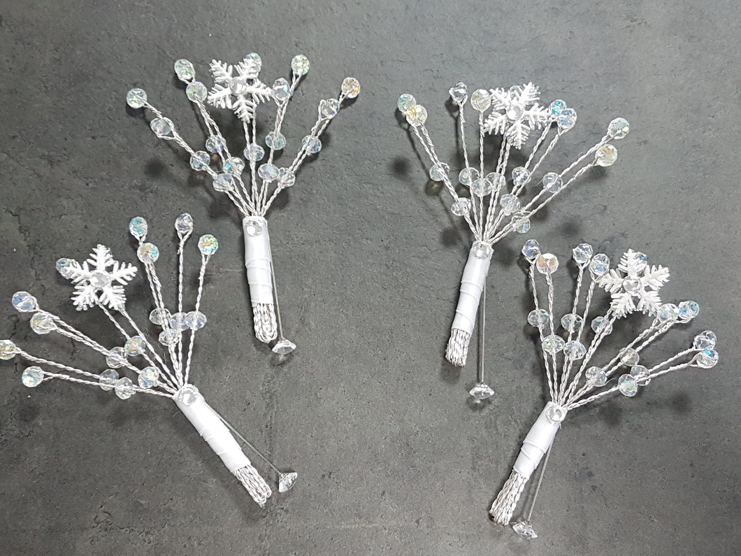 Snowflake buttonhole with Ab crystals  for a Winter wedding by Crystal wedding uk